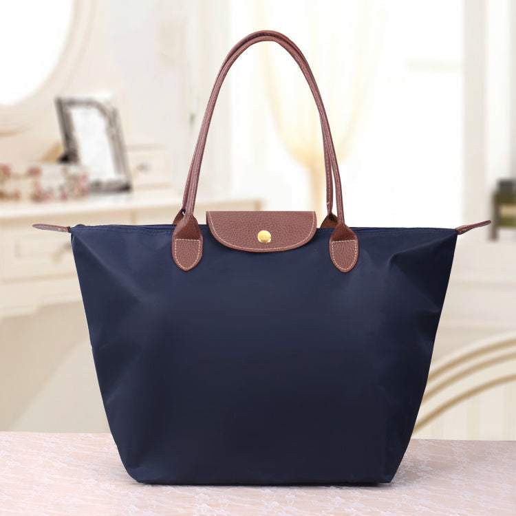 Luxe Voyage Tote Bag